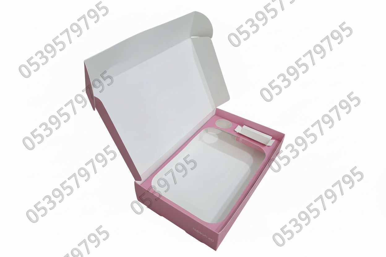 Pink and white container with a lid on a surface with a colorful patterned tile background.