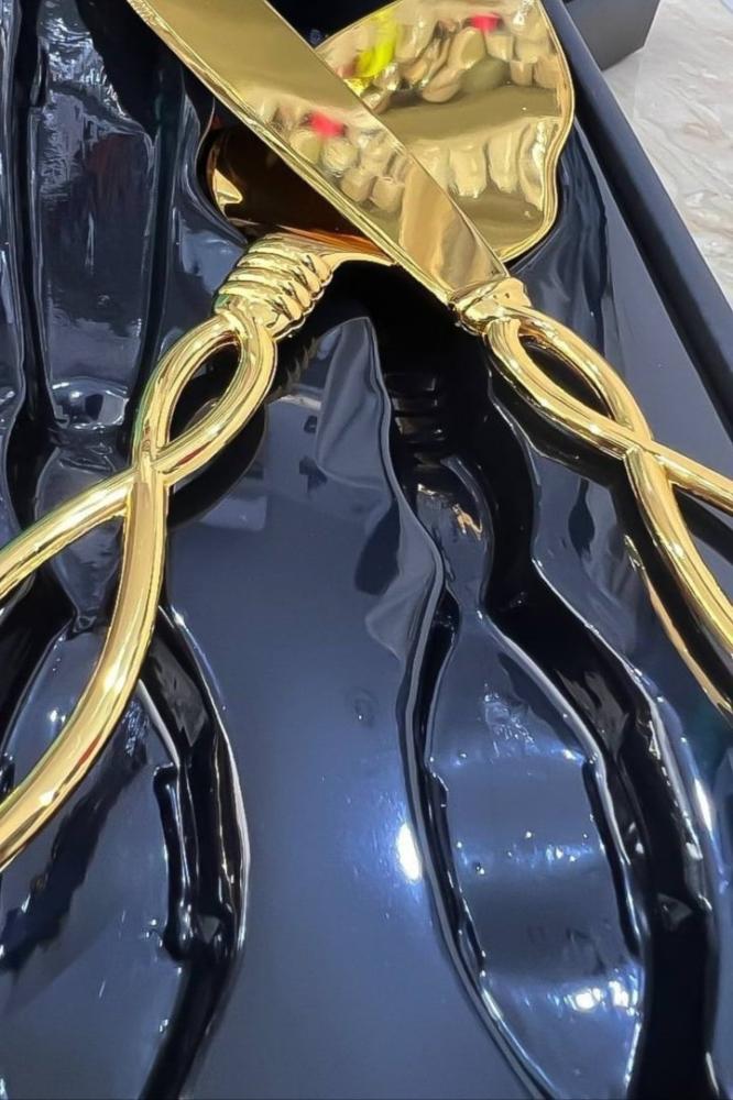 A luxurious golden cake cutting set with a carrier — product image 2