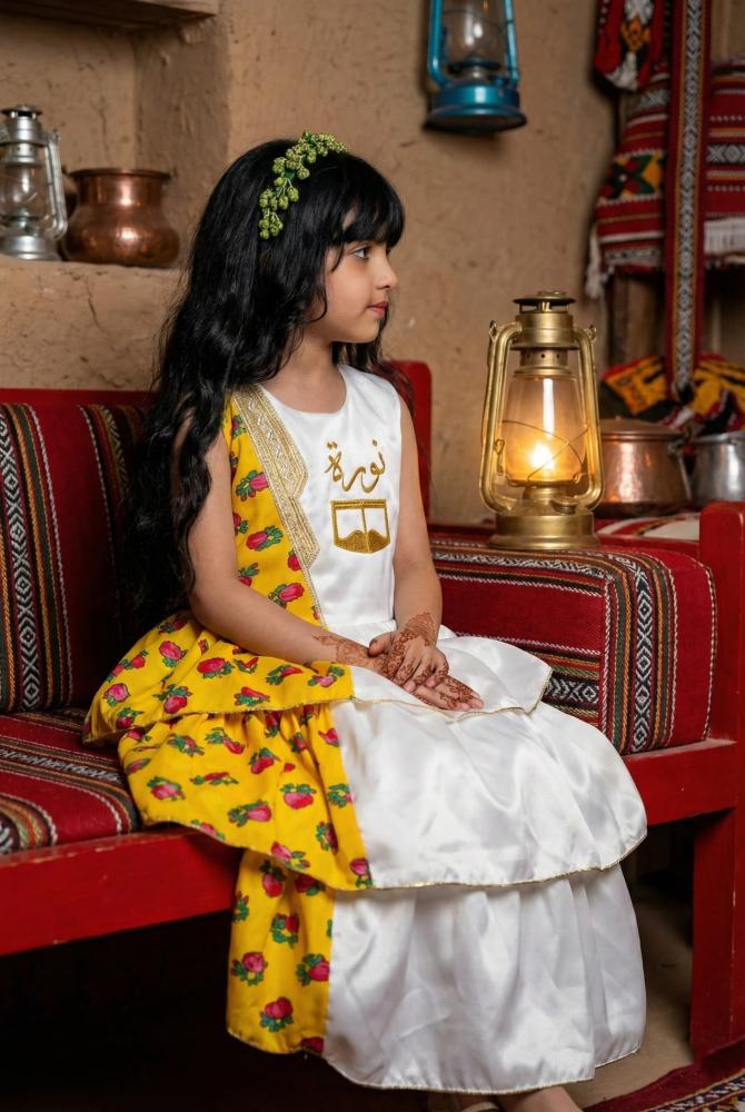 Girls' white and yellow shalky dress with a cheerful and elegant Ramadan design — product image 2