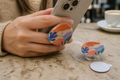 Custom printed stationary acrylic phone grip with strong adhesive base