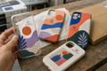 Custom full-colour printed phone cases with fictional English brand designs