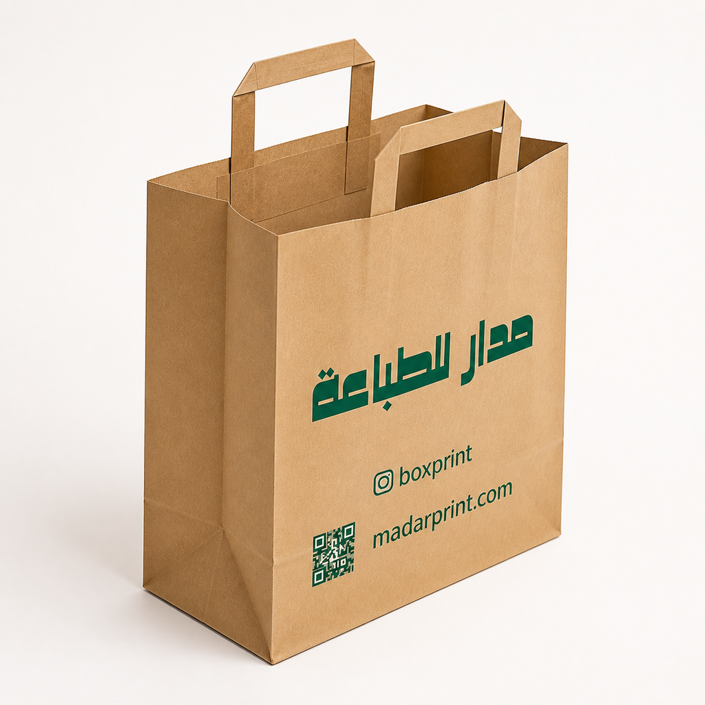 Empty brown kraft paper shopping bag viewed open from the side to show the gusset and capacity