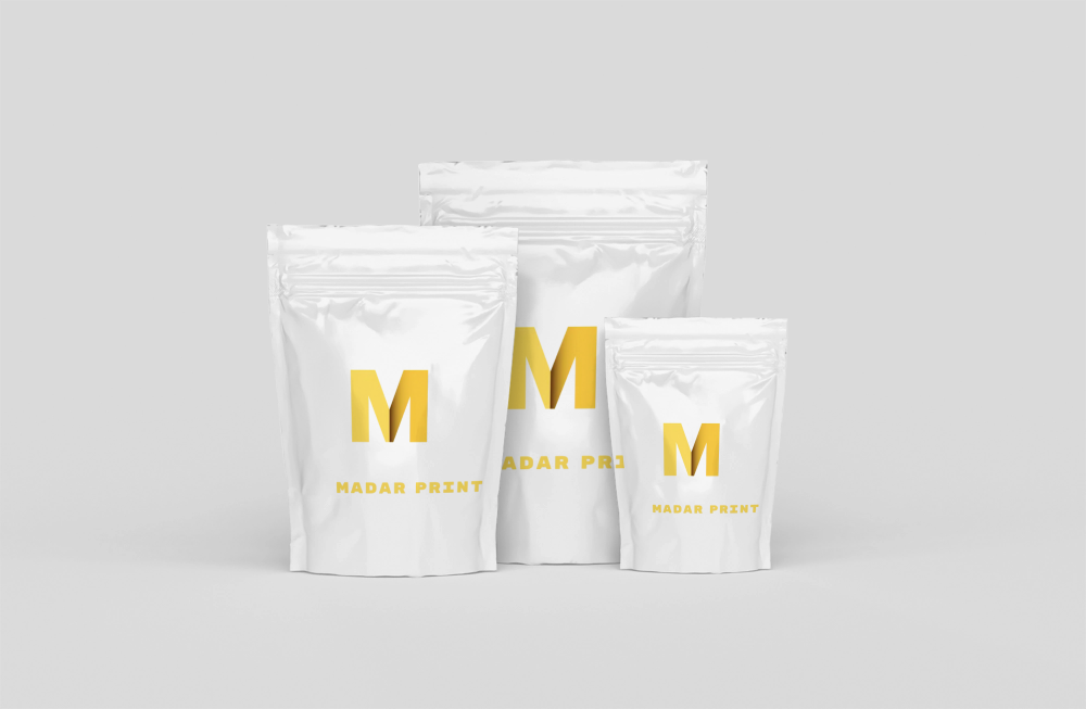 Three white resealable packaging bags with yellow 'Madar Print' logo, varying sizes for versatile use.