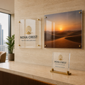 Custom acrylic wall logo, photographic art panel and desk display in a modern Saudi office