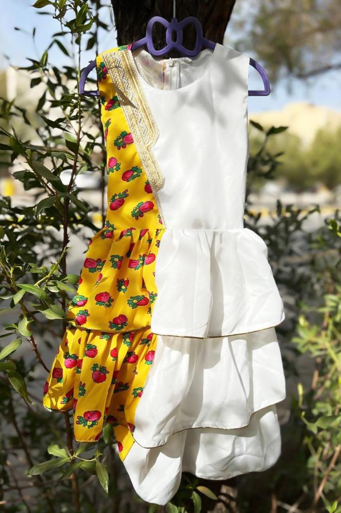 Girls' white and yellow shalky dress with a cheerful and elegant Ramadan design — product image 6