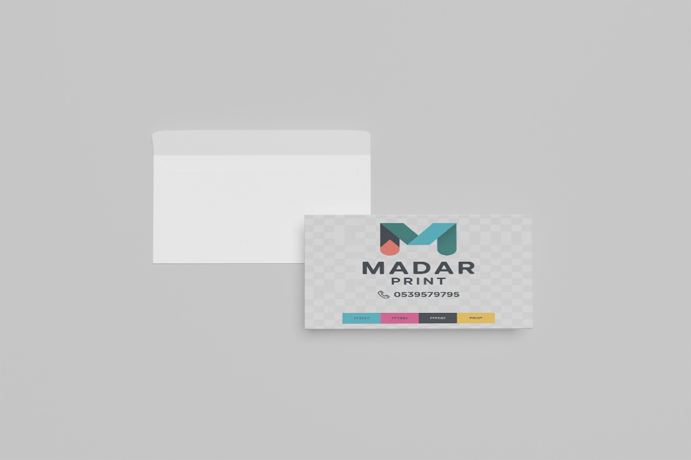 Custom business card and white envelope by Madar Print, featuring colorful logo and contact information.