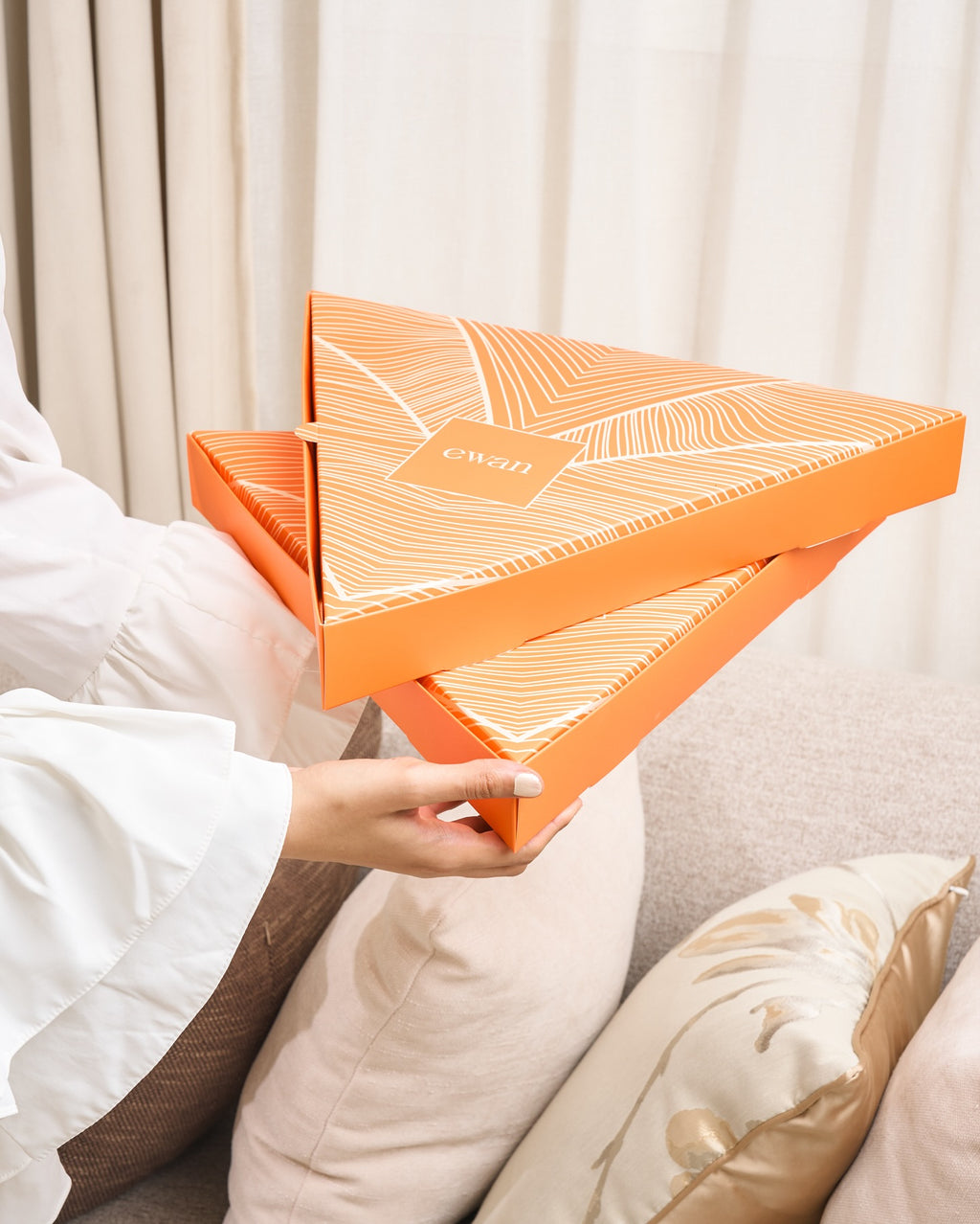 Stacked custom printed orange catering boxes with separate full-cover lids