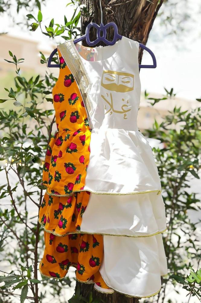 Girls' white and orange shalky dress with an elegant traditional design for Ramadan — product image 5