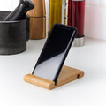 Wooden mobile phone stand with vinyl or thermal surface printing — product image 1