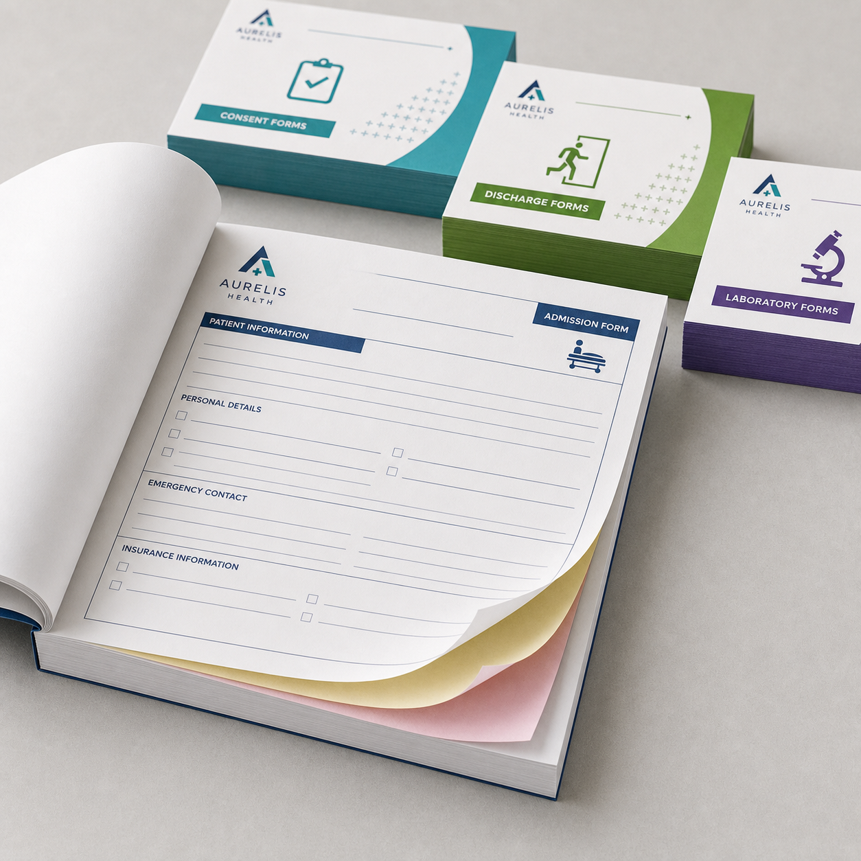 Hospital admission NCR form pad opened to show blank carbonless duplicate layers