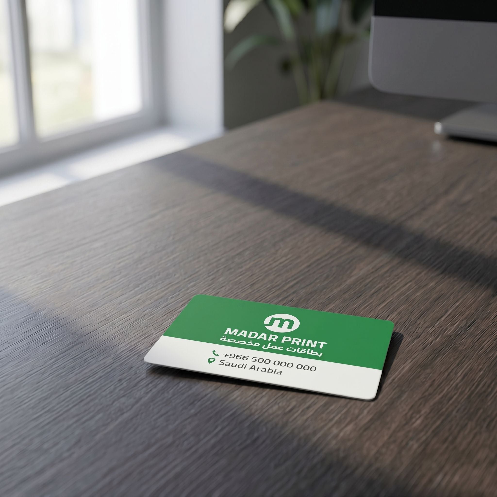 Small ألوان كاملة ID card مع vibrant design موضوع على textured dark مكتب خشبي in an office setting.
