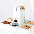 Custom gathering box reference with central beverage dispenser, serving tap, cups and four food trays